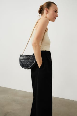 Saddle Clutch “glossy black crocodile”