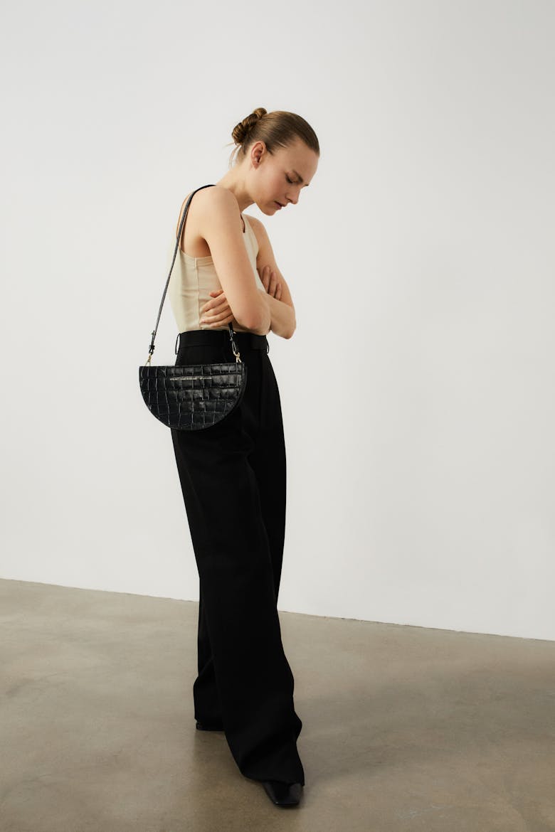 Saddle Clutch “glossy black crocodile”