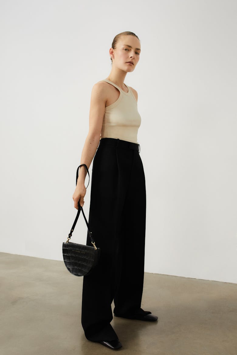 Saddle Clutch “glossy black crocodile”