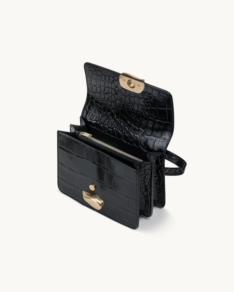 Mini Belt Bag with Sculptural Seal “glossy black crocodile”