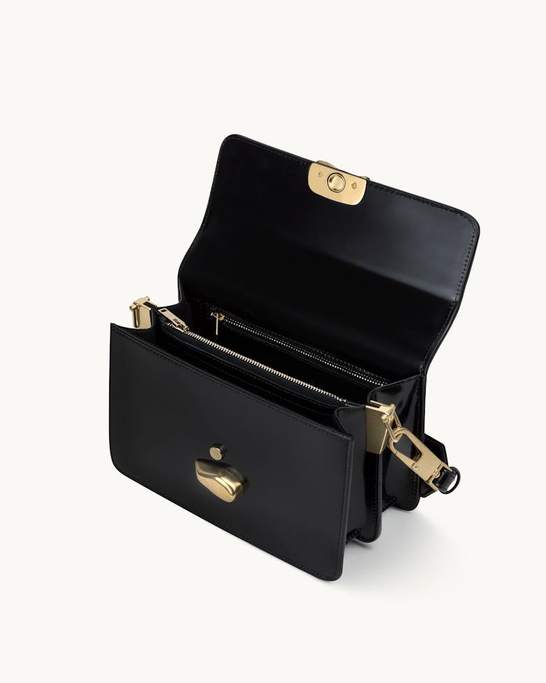 Shoulder Bag with Sculptural Seal “glossy black”
