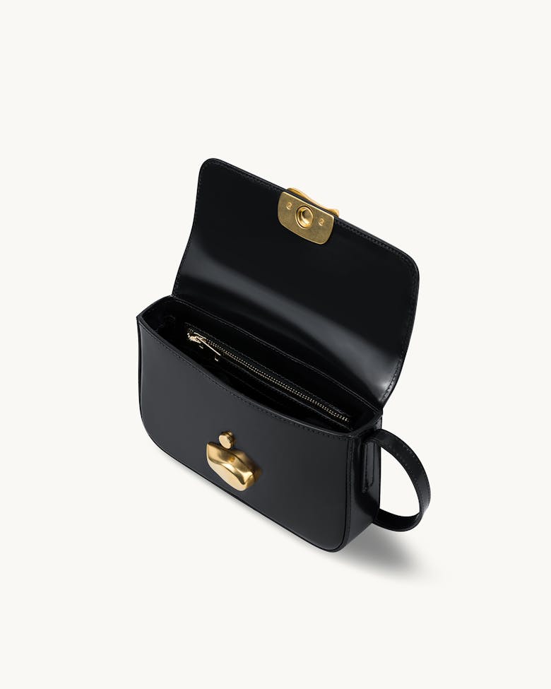 Flap Bag with Sculptural Seal “glossy black”