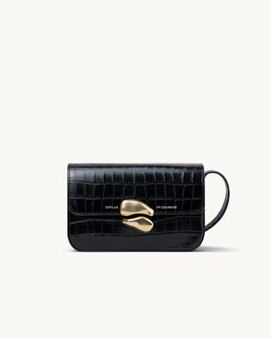 Flap Bag with Sculptural Seal “glossy black crocodile”