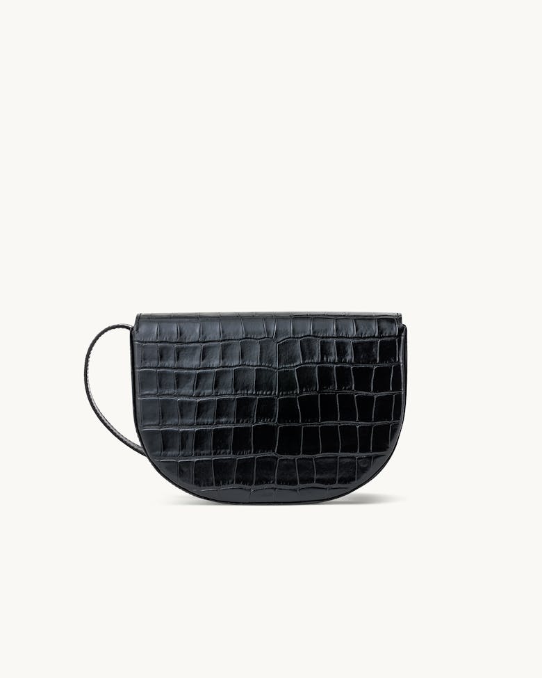 Saddle Bag with Sculptural Seal “glossy black crocodile”