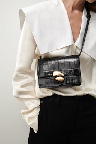 Mini Belt Bag with Sculptural Seal “glossy black crocodile”
