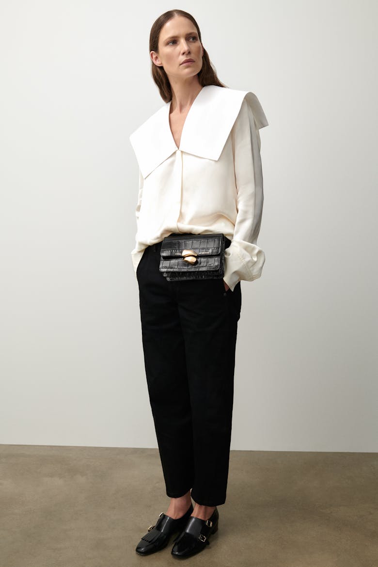 Mini Belt Bag with Sculptural Seal “glossy black crocodile”