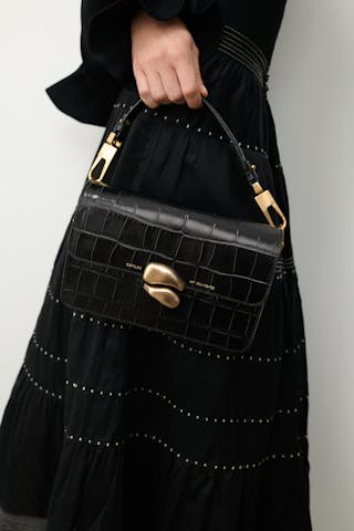 Shoulder Bag with Sculptural Seal “glossy black crocodile”