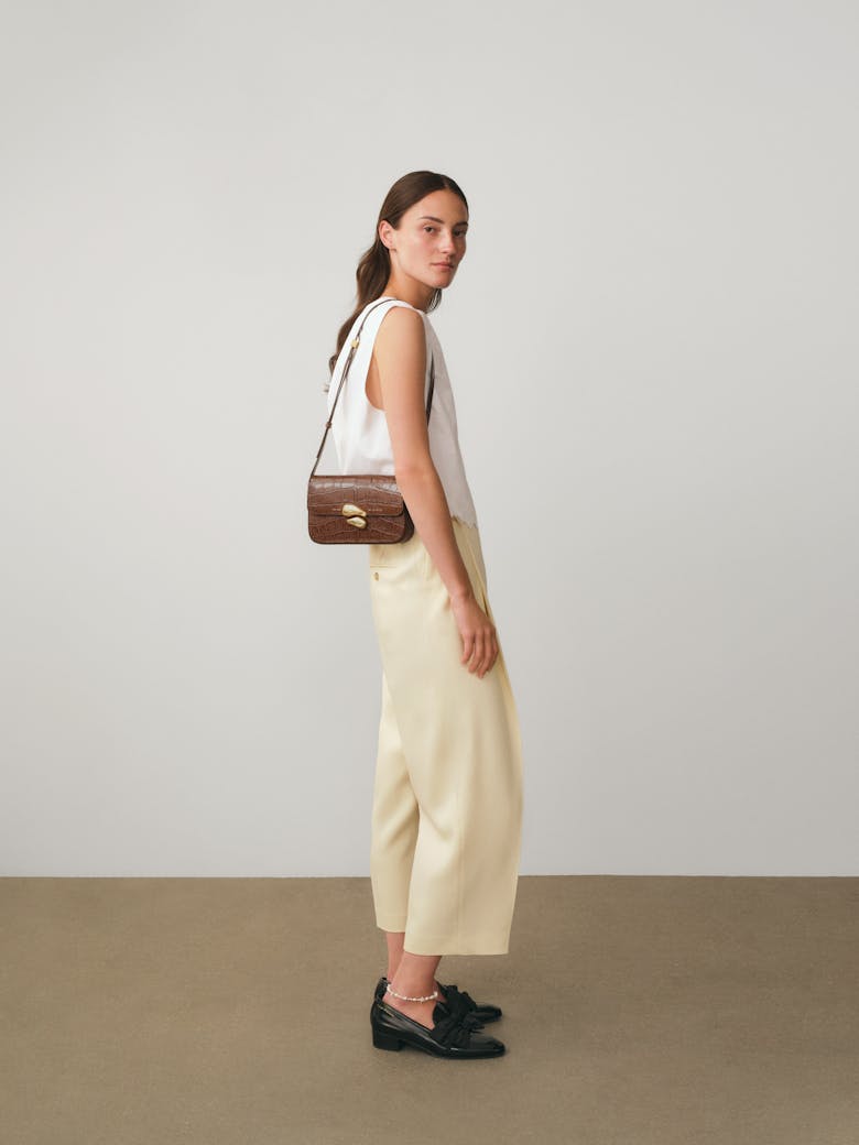 Flap Bag with Sculptural Seal “glossy hazelnut crocodile”