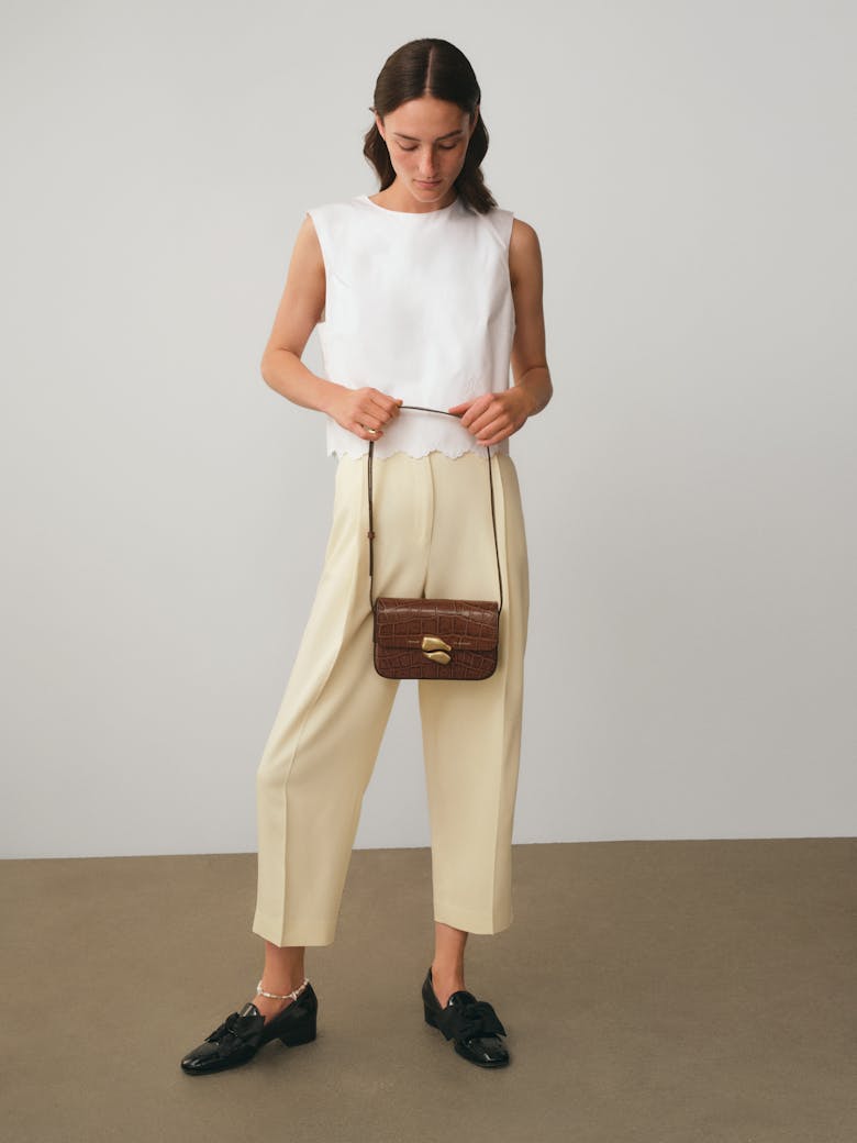 Flap Bag with Sculptural Seal “glossy hazelnut crocodile”