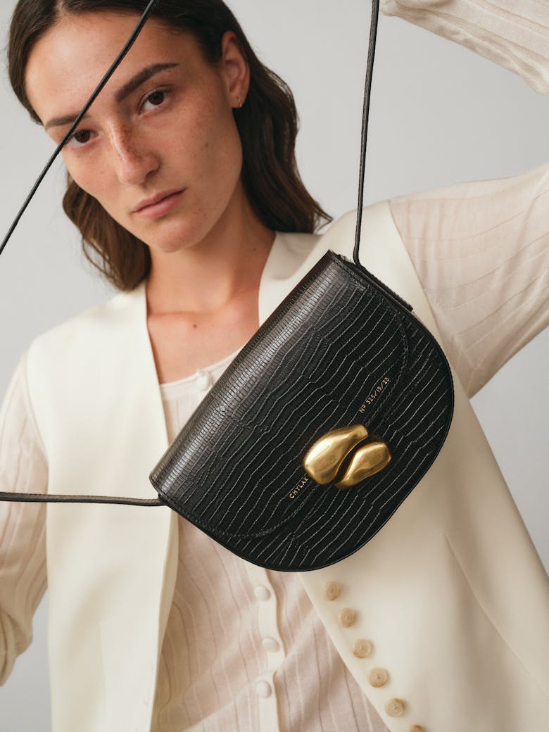 Saddle Bag with Sculptural Seal “black lizard”