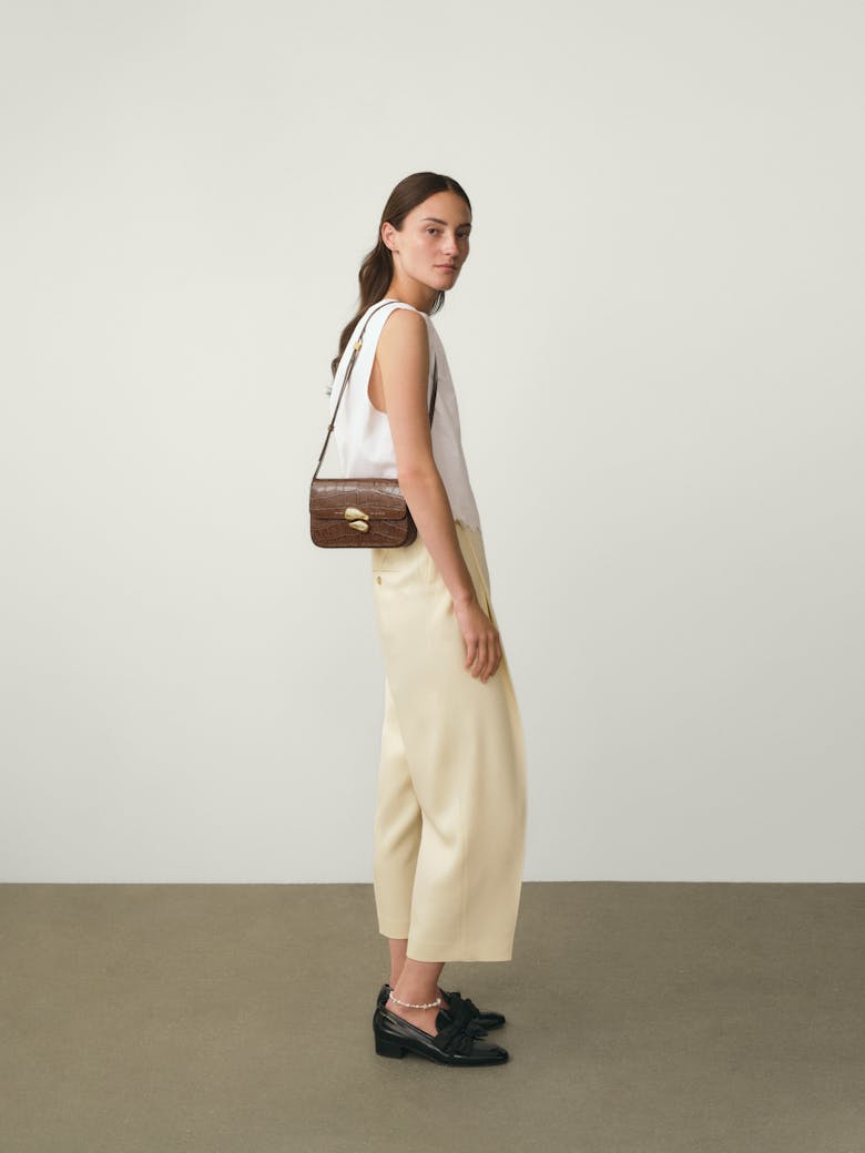 Flap Bag with Sculptural Seal “glossy hazelnut crocodile”
