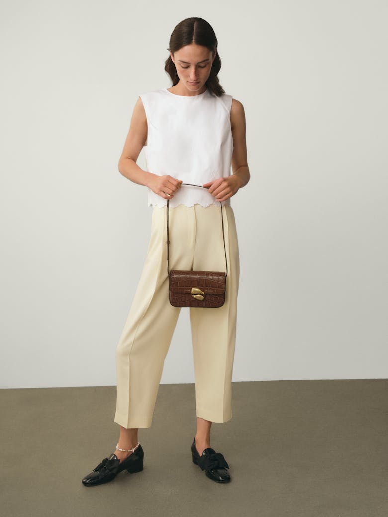 Flap Bag with Sculptural Seal “glossy hazelnut crocodile”