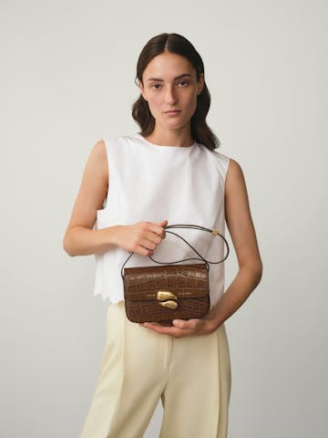 Flap Bag with Sculptural Seal “glossy hazelnut crocodile”