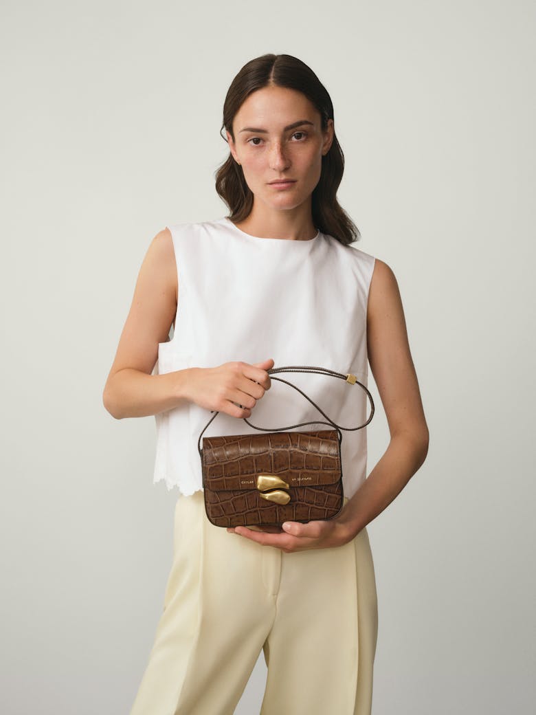 Flap Bag with Sculptural Seal “glossy hazelnut crocodile”